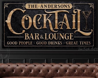 May include: A black and gold sign with the text "The Andersons Cocktail Bar & Lounge - Good People Good Drinks Great Times" and a martini glass graphic.