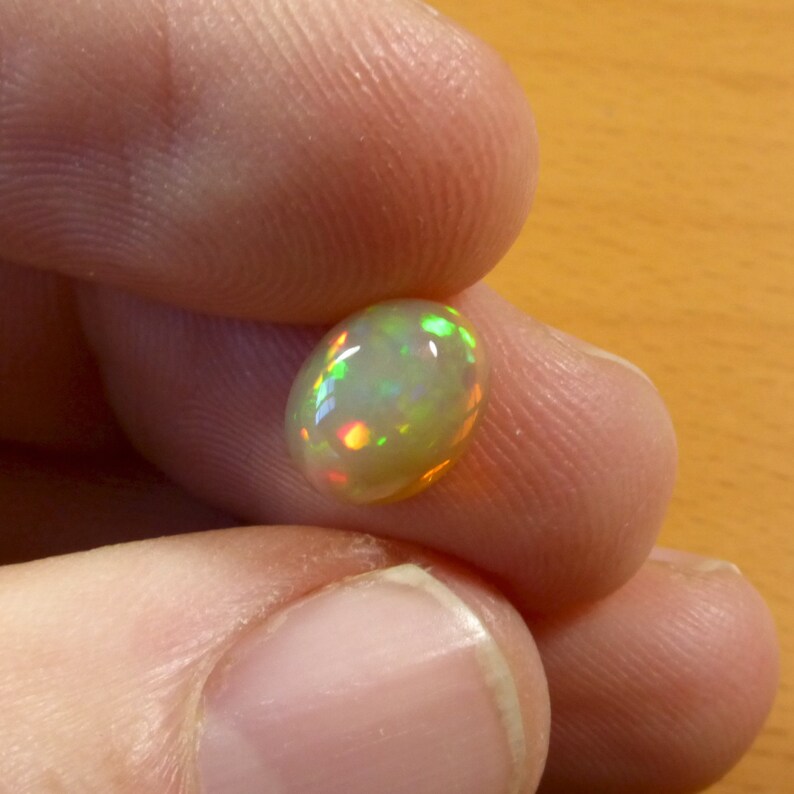 Stunning Oval Ethiopian Crystal Opal Patchwork flash Welo Intense Colour B22 Freeform Opal Delta Welo Opal
