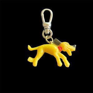 Vintage Cracker Jack Charm Toy Prize Disney Pluto Character Dog Celluloid Charm on a silver swivel clasp