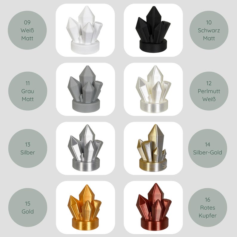 May include: A range of crystal-shaped ornaments in colours such as white, black, grey, silver, gold, and red-copper. Each piece has a textured surface and sits on a small base. The image also includes colour labels.