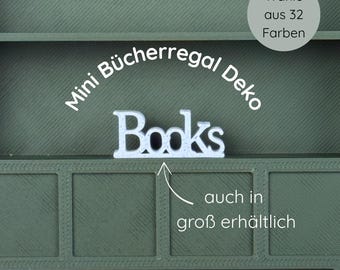 May include: A miniature green bookshelf with the word "Books" in white letters. The text "Mini Bücherregal Deko" is arched above the bookshelf. A circular graphic states "Wähle aus 32 Farben".