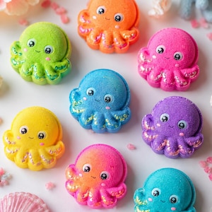 May include: A collection of eight octopus-shaped bath bombs in vibrant colors including orange, lime green, hot pink, bright blue, yellow, purple, coral, and teal. Each bath bomb features a smooth rounded head, eight tentacles, and glitter.