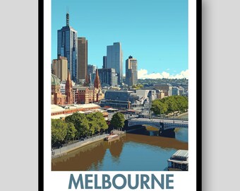 May include: A framed art print featuring a stylized illustration of the Melbourne, Australia skyline. The image depicts tall skyscrapers, historic buildings, a bridge over the Yarra River, and green trees under a clear blue sky. Text reads MELBOURNE AUSTRALIA.