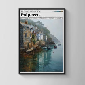 May include: Framed art print of Polperro, a coastal village in Cornwall. The image shows buildings along the water's edge, with boats in the harbor. The text at the top reads "The Cornish Collection" and "Polperro". The print has a black frame.