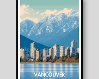 May include: A framed travel poster featuring a cityscape of Vancouver, Canada, with tall buildings along a waterfront. In the background, large snow-capped mountains rise against a light blue sky with clouds. The word VANCOUVER is printed in white.
