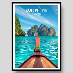 May include: A travel poster featuring a view from the bow of a wooden long-tail boat looking out toward limestone cliffs in turquoise water. The sky is bright blue with wispy clouds. The text KOH PHI PHI THAILAND is printed in white at the top.