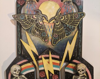 Oblivion, Fine modern craft, woodcut art, assemblage art, skelleton, moth, lightening, rainbow, eyes, tear drop, fine craft, art