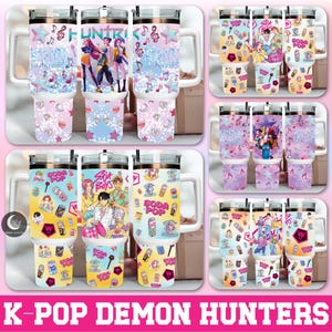 May include: A collection of K-Pop Demon Hunters themed tumblers. The tumblers feature colorful designs with musical notes, stars, and anime-style characters. The tumblers have white handles and lids, and the text "K-POP DEMON HUNTERS" is at the bottom.