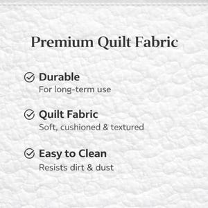 May include: White quilted fabric with the text "Premium Quilt Fabric." The image highlights the fabric's durability, softness, and ease of cleaning. The text also mentions the fabric is cushioned and textured.