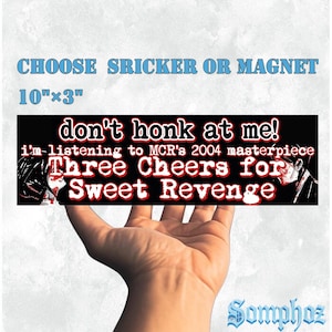 May include: A black bumper sticker with the text "don't honk at me!" and "Three Cheers for Sweet Revenge." The sticker is 10" x 3" and includes the phrase "i'm-listening to MCR's 2004 masterpiece." The words "CHOOSE SRICKER OR MAGNET" are at the top.