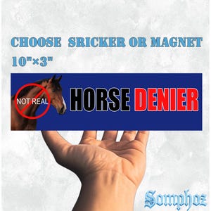 May include: A blue rectangular sticker or magnet with the text "HORSE DENIER" in black and red. The image includes a horse with a red circle and the words "NOT REAL". The sticker measures 10" x 3".