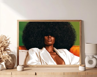 May include: A framed wall art print featuring a portrait of a person with voluminous dark curly hair covering their eyes. The person wears a white blazer against a green background and orange seating, rendered in a bold, graphic illustration style.