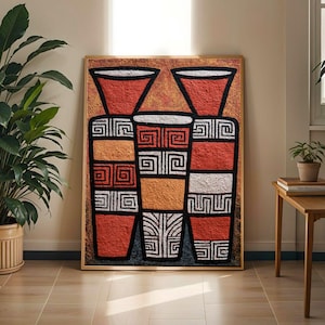 Puede incluir: Una obra de arte mural rectangular en un marco de madera que presenta una pintura texturizada de tres vasijas altas. Las vasijas están decoradas con patrones geométricos en tonos terracota, naranja, blanco y negro sobre un fondo cálido.