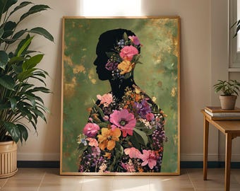 May include: A framed art print featuring a black silhouette of a person filled with colorful flowers. The background is a textured green with gold accents. The flowers include pink, orange, and purple blooms.