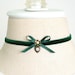 see more listings in the Bow Charm Chokers section