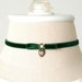 see more listings in the Bow Charm Chokers section