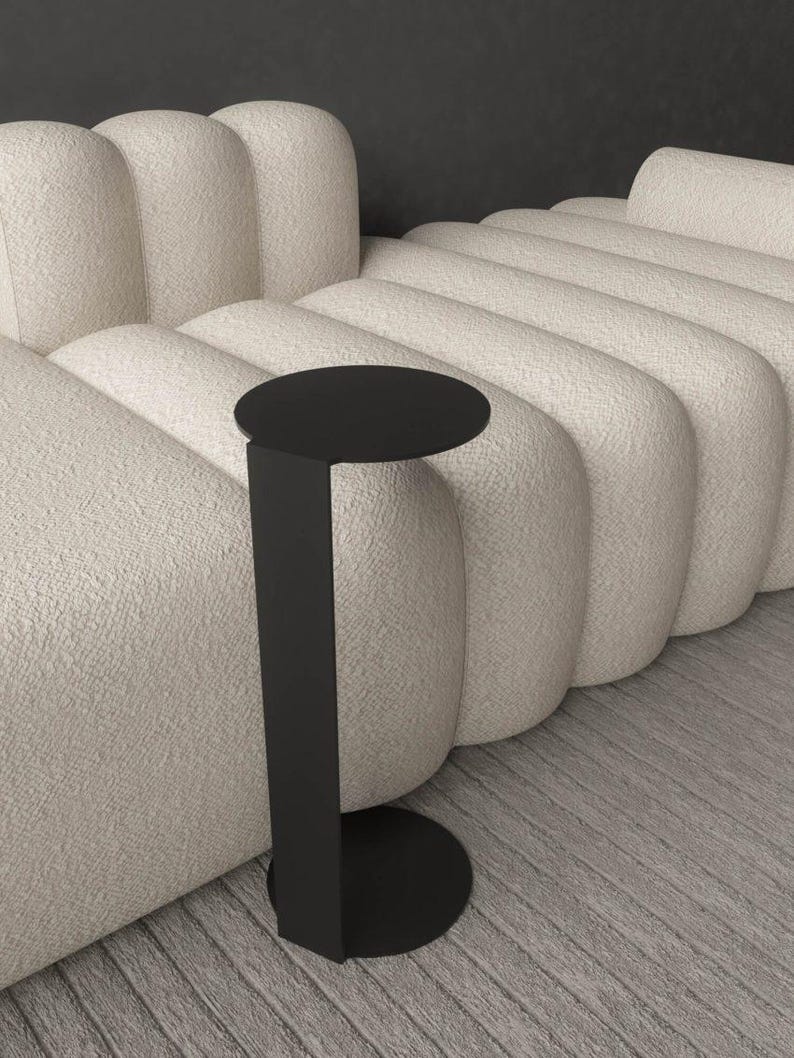 side table
contemporary table
coffee table
metal frame
steel legs
handmade furniture
round table base
compact table
black side table
metal side table
steel table
side tables
small coffee table