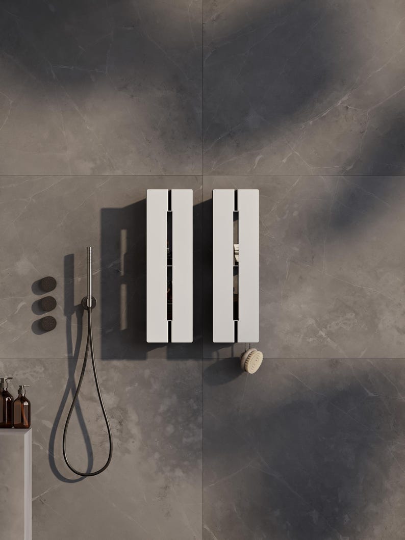 floating shelf
vertical wall shelf
wall shelf
shower shelf
bathroom shelves
hidden shelves
black shelf
metal shelves
custom shelves
bathroom storage
wall mounted shelf
modern shelves
waterproof shelf
