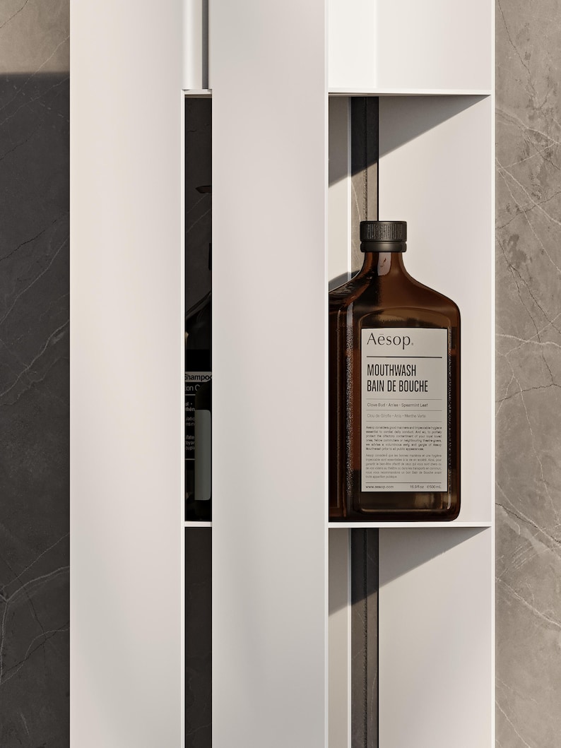 floating shelf
vertical wall shelf
wall shelf
shower shelf
bathroom shelves
hidden shelves
black shelf
metal shelves
custom shelves
bathroom storage
wall mounted shelf
modern shelves
waterproof shelf
