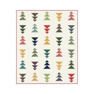 May include: A quilt featuring a repeating pattern of stylized Christmas trees. The trees are composed of layered triangles in various colors and patterns, including red, green, blue, and yellow, set against a cream background. The quilt is framed by a red border.