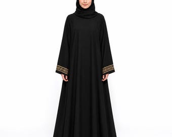 Abaya in cotone – Abito lungo modesto con nastro sulle maniche e tasche laterali.