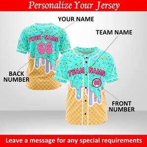 May include: Two baseball jerseys with a unique ice cream cone design. The jerseys are light blue with sprinkles and pink accents. The bottom half of the jersey is a waffle cone pattern. Text on the jerseys includes "YOUR NAME", "TEAM NAME", and numbers.