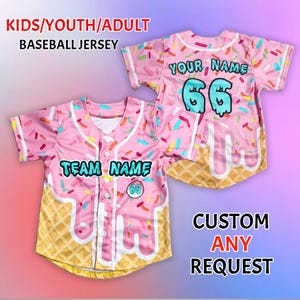 May include: Pink baseball jersey with a colorful sprinkle pattern, a waffle cone design, and the text "TEAM NAME" and "YOUR NAME". The jersey is available in youth and adult sizes.