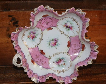 Antique pink dish handled porcelain