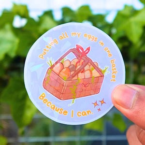 Al mijn eieren in één mand leggen omdat het kan - holografische vinylsticker