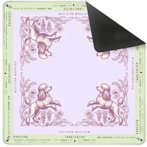 May include: A rectangular mousepad featuring a light purple background with a decorative border and four poodle illustrations. The border includes floral elements and text that reads "Charleston" and "Dragons".