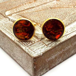 Gemelos de bronce con concha de paua - Gemelos naranjas y marrones