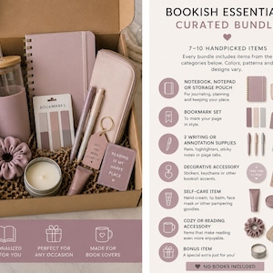 May include: A curated bundle in a cardboard box containing a mauve spiral notebook, a glass tumbler with a bamboo lid, a mauve storage pouch, a set of bookmarks, two pens, a keychain, a candle in a tin, a tube of cream, and a mauve scrunchie.