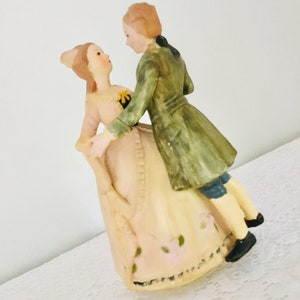 Vintage plastic rotating musical dancing man and woman