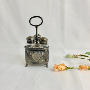 Antique F B Rogers Silver Co vintage salt & pepper shakers with Footed caddy