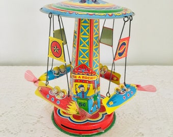 Schylling Collector Series Ride A Rocket Tin Toy Carousel 2000 works Great