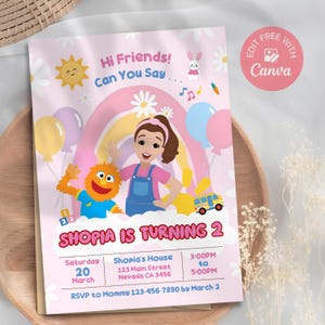 May include: A pink birthday party invitation with the text "Shopia is Turning 2". The invitation features cartoon illustrations of a girl, a monster, a rainbow, balloons, and a school bus. The invitation also includes party details.