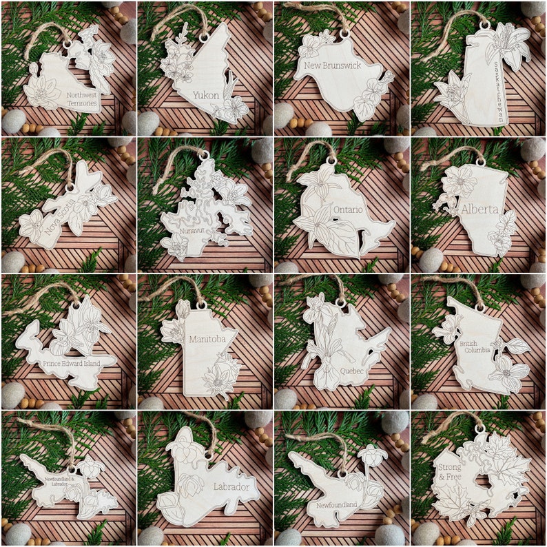 May include: A set of 12 wooden ornaments shaped like the provinces and territories of Canada. Each ornament is decorated with a floral design and the name of the province or territory.