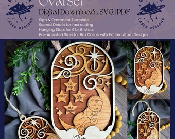 May include: A set of two wooden oval ornaments with a baby sleeping on a crescent moon, stars, and clouds. The larger ornament has the name "Octavia" and the smaller ornament has the name "Every Grace".
