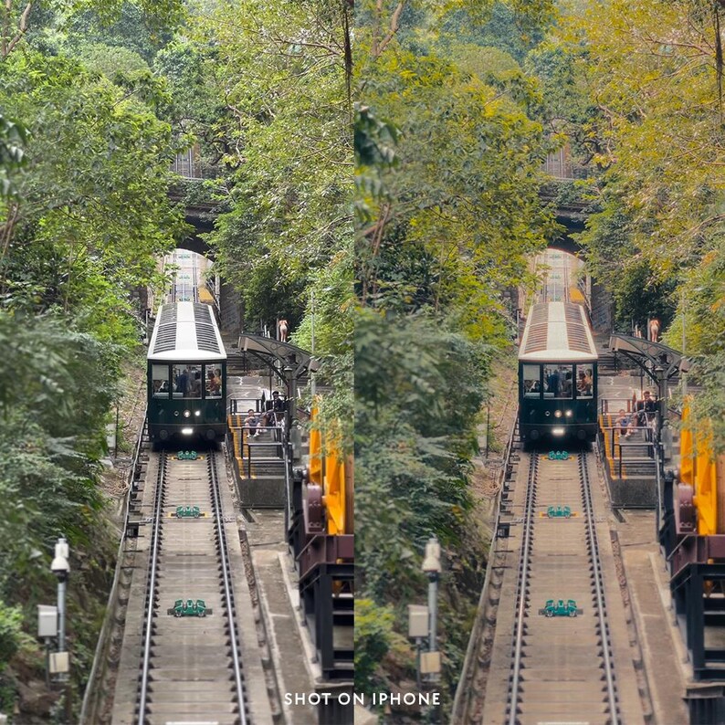 May include: A funicular train ascends a steep track through a lush, green forest. The train is dark green and white, with passengers visible inside. The track is flanked by trees and leads to a tunnel. The image is labeled "SHOT ON IPHONE".