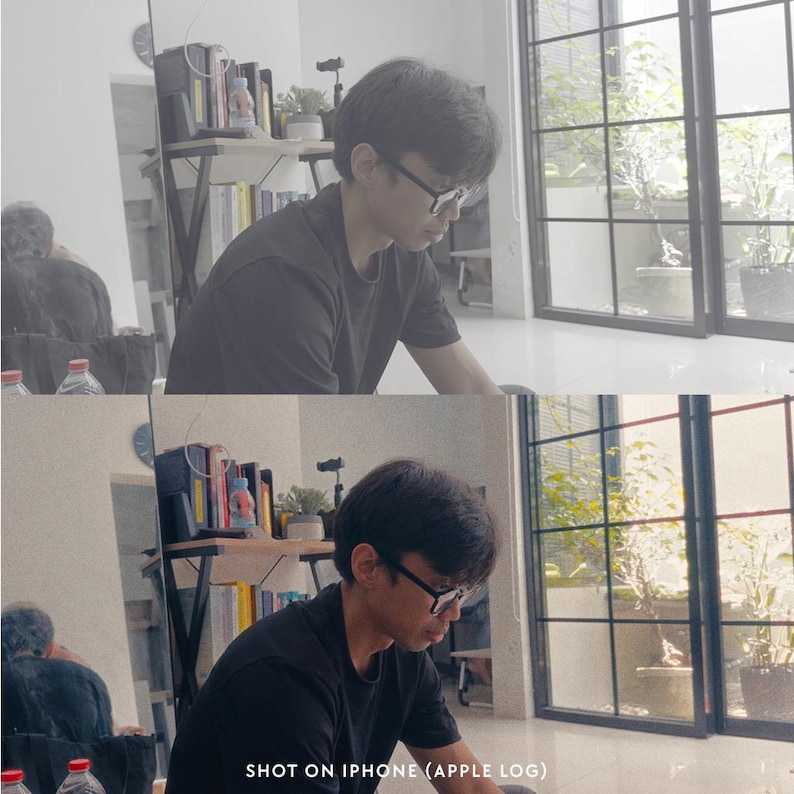 May include: A person wearing a black shirt and glasses, working indoors. The image is taken in natural light, with a window and plants visible in the background. The text "SHOT ON IPHONE (APPLE LOG)" is at the bottom.