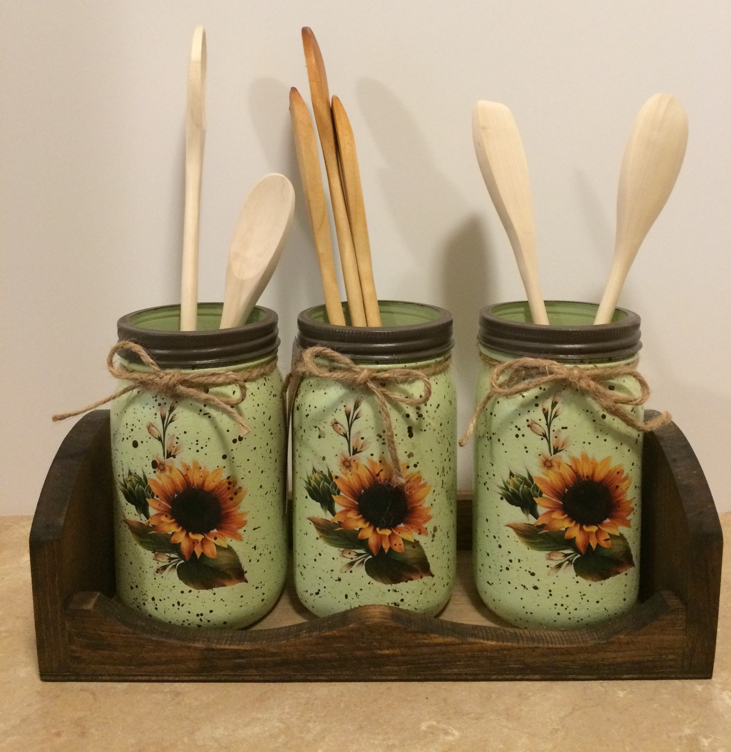 Sunflower kitchen cookie jar, 3 piece canister set, paper towel holder,  napkin holder, utensil holder and misc decor for Sale in Glendora, CA -  OfferUp