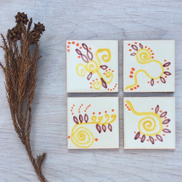 Coasters in ceramic, set with 4 tile coasters hand painted with abstract shapes, in yellows and brown, free shipping worldwide