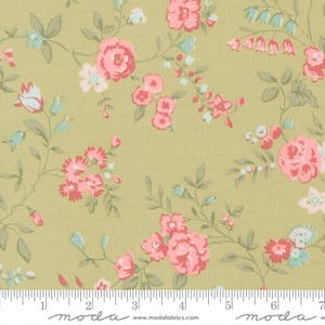 May include: Floral fabric with a light green background. The fabric features pink roses, small pink and white flowers, and light blue accents. The flowers are connected by green stems and leaves. A ruler is at the bottom of the fabric.