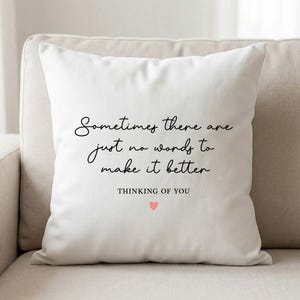 May include: White square throw pillow with the text "Sometimes there are just no words to make it better" in black script. Below the text is "Thinking of You" and a small pink heart.