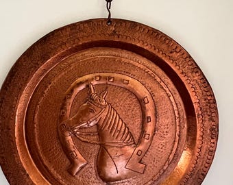 Arte mural de caballo de cobre