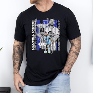 a man wearing a t - shirt with a picture of two men on it