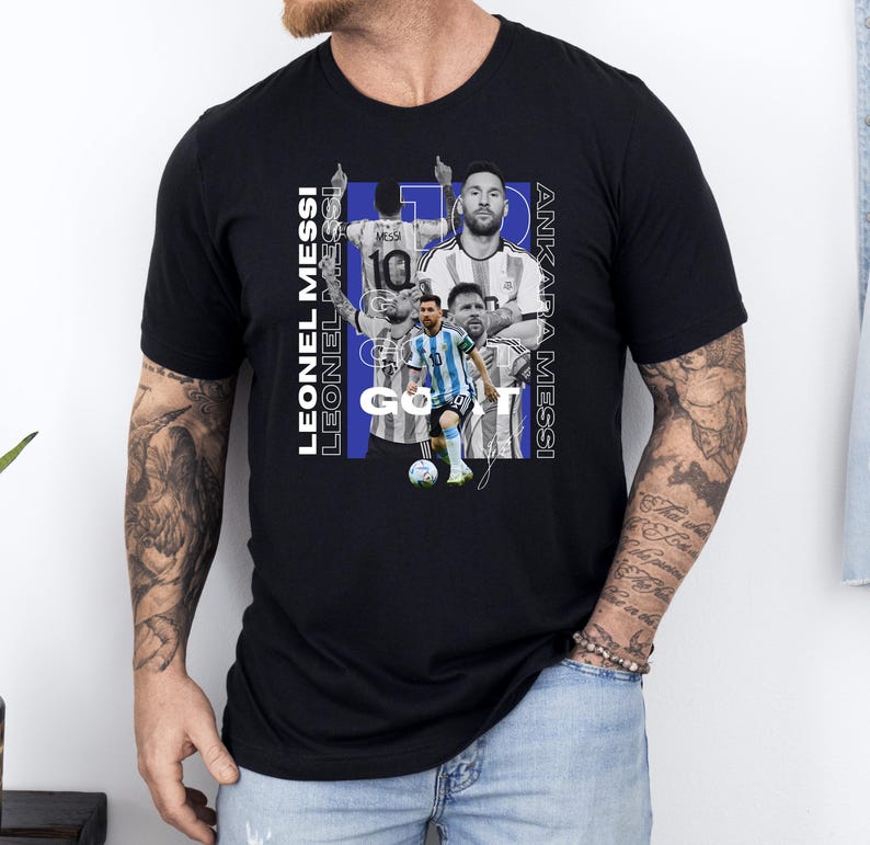 a man wearing a t - shirt with a picture of two men on it