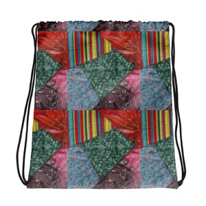 May include: A drawstring backpack featuring a repeating patchwork pattern of various fabric designs, including red floral motifs, vertical multicolored stripes, dark green textured sections, and light blue fabric with small floral prints.