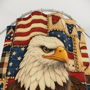 May include: A shower curtain featuring a detailed illustration of a bald eagle with a stern expression. The background is a patchwork design incorporating the American flag with red and white stripes, blue stars, and tan fabric.