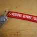 hlyndean reviewed remove before flight, magnetic bottle opener and key chain